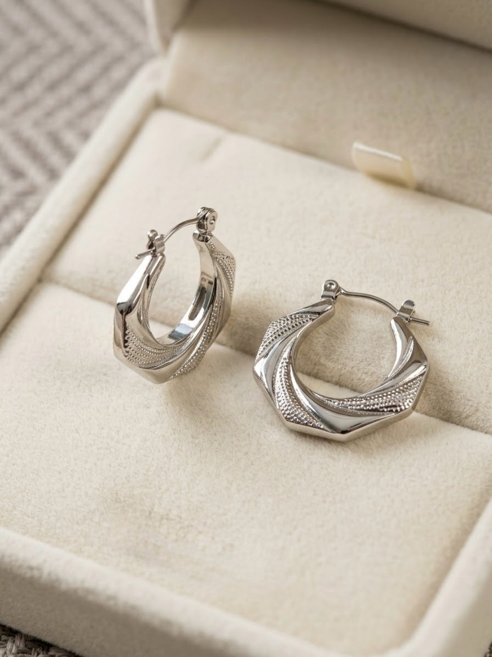 Sterling-Style Twisted Hoop Earrings in Silver. Stainless steel waterproof